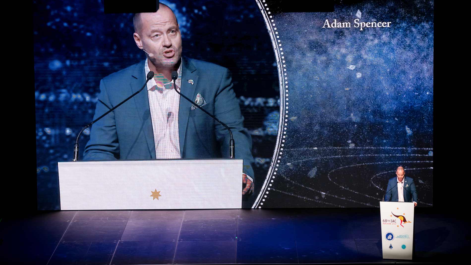 Adam Spencer speaking at the IAC conference - All Occasions Group